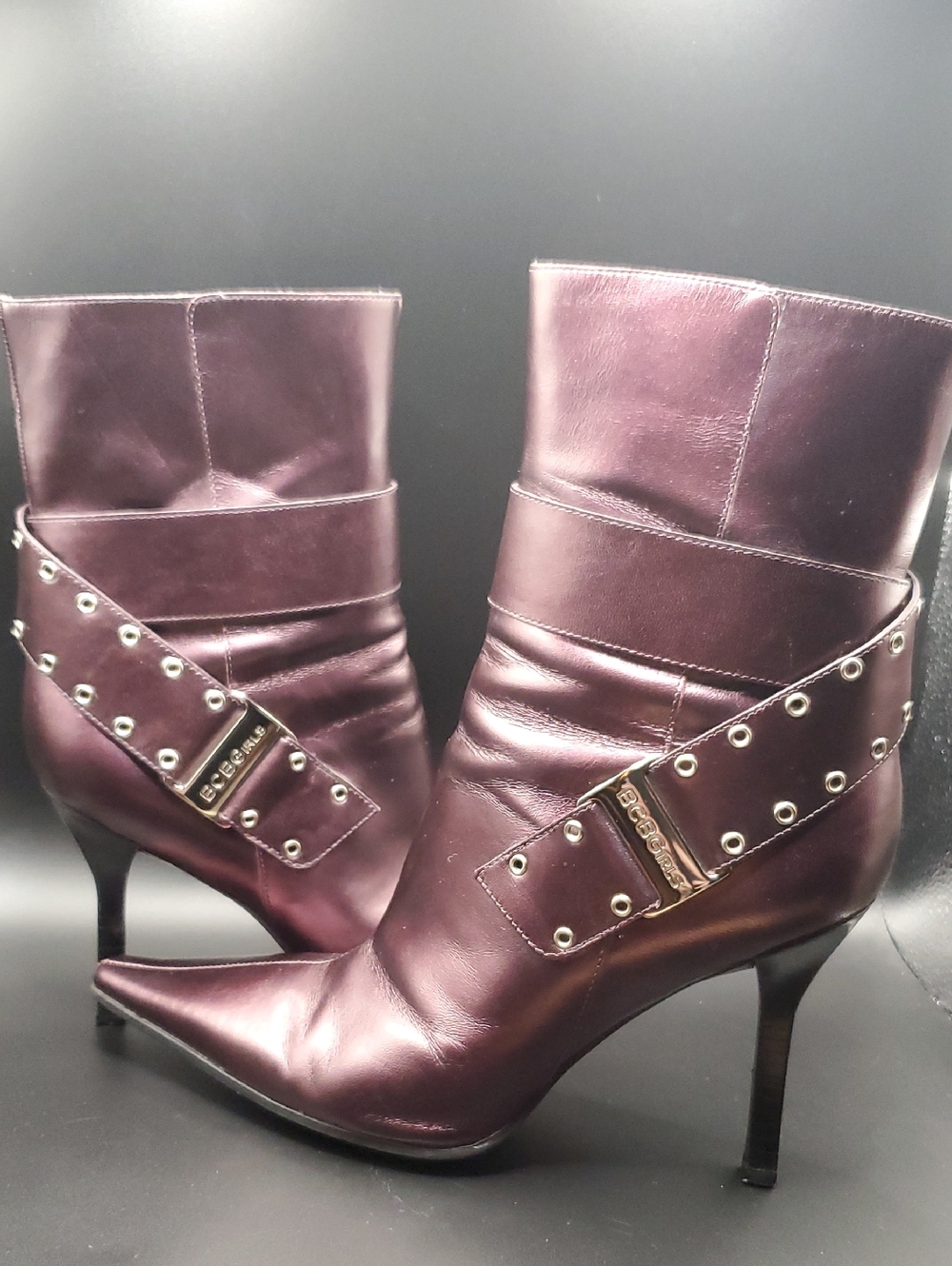 Vantage BCBGirls Plum Pointed-Toe Grommet Strap Ankle Boots